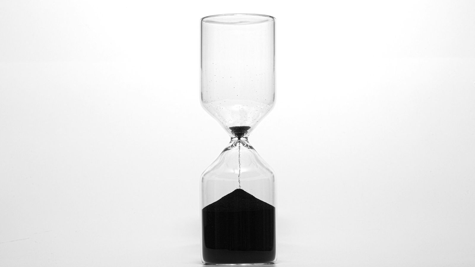 An hourglass against a bright background